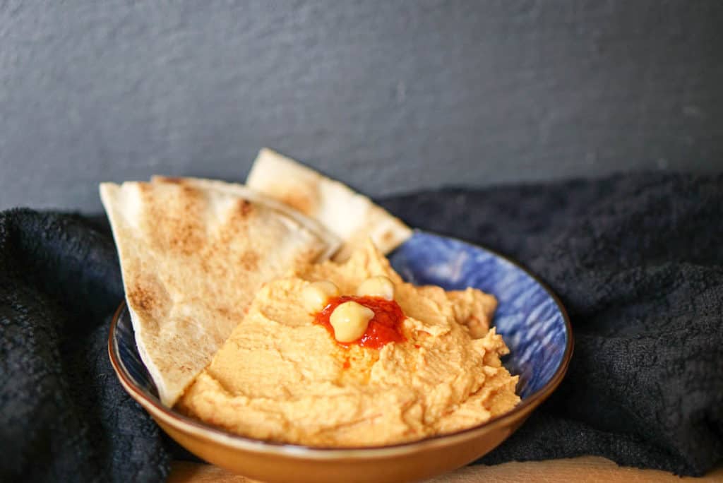 hummus with harissa chili paste
