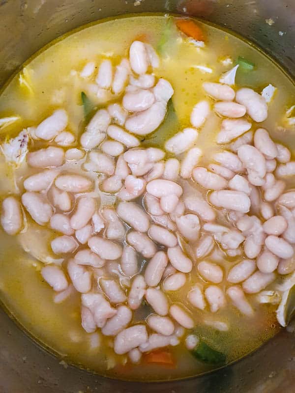 Adding white beans to the chicken soup